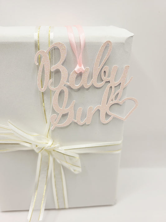 Decorative baby girl gift tag. Made from baby pink glitter card and reinforced with 300gsm card. This tag is non-writeable and is perfect for baby showers, christenings, birthdays and many more special occasions