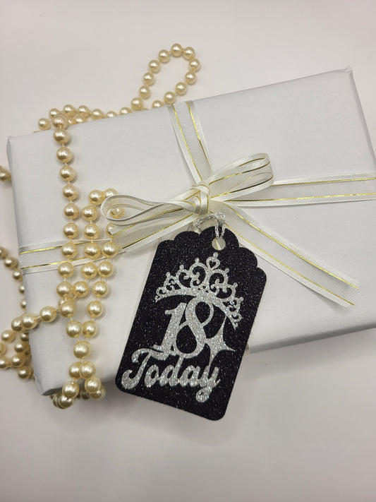 Milestone Age gift tag is made from black glitter card with the age 18 and tiara stuck on the front in silver glitter card