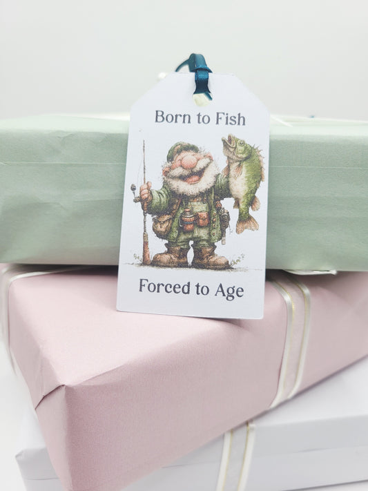 Rectangular gift tag with an old fisherman holding a fish in one hand and a rod in the other with the quote Born to Fish Forced to age