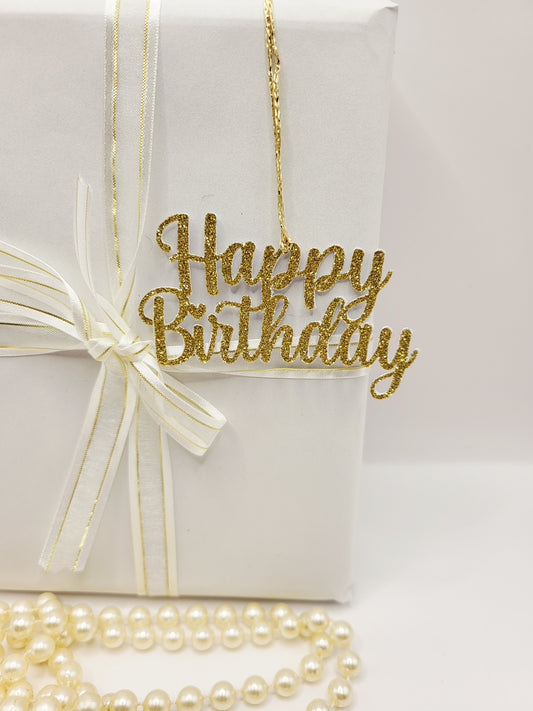 Decorative gold glitter happy birthday gift tag is for decorative purpose only. This tag cannot be written on because it is the words happy birthday only