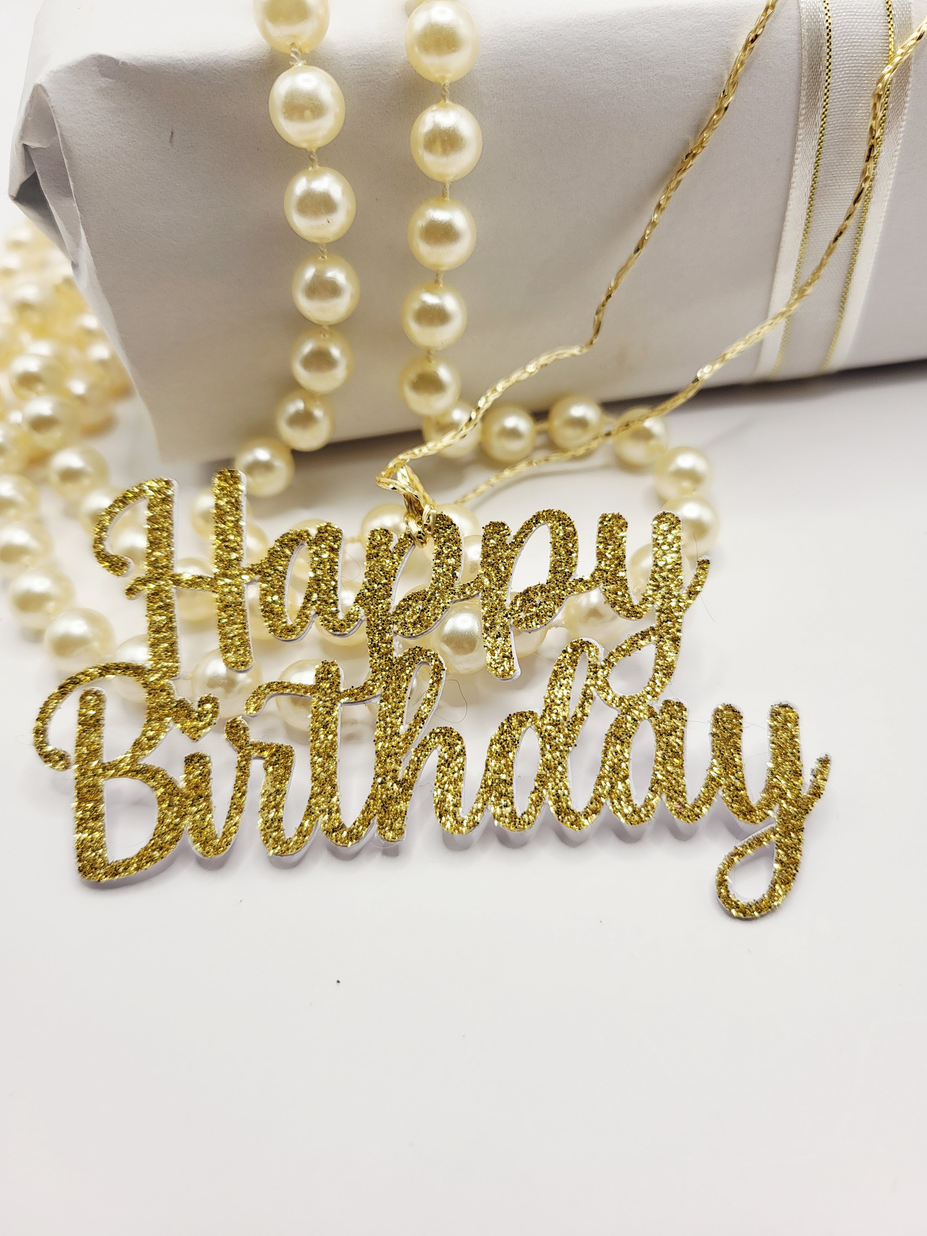 Decorative gold glitter happy birthday gift tag is for decorative purpose only. This tag cannot be written on because it is the words happy birthday only